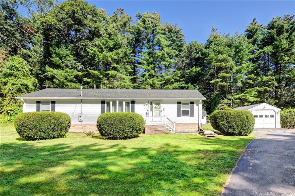 5 State Line Road Stafford, CT 06076 - Photo 1 of 1 a house view with a garden space