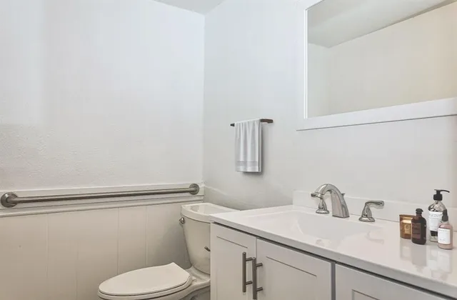 a bathroom with a sink and a toilet
