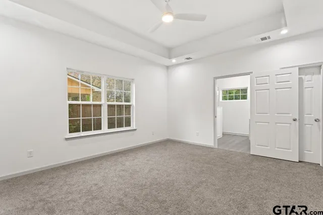 an empty room with windows