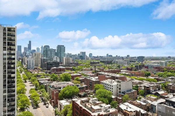 a view of a city with tall buildings