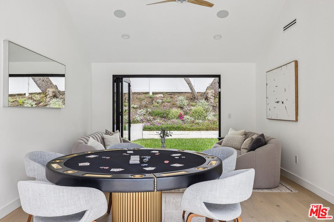 5565 Jed Smith Road Hidden Hills, CA 91302 - Photo 43 of 46 a room with furniture and a large window