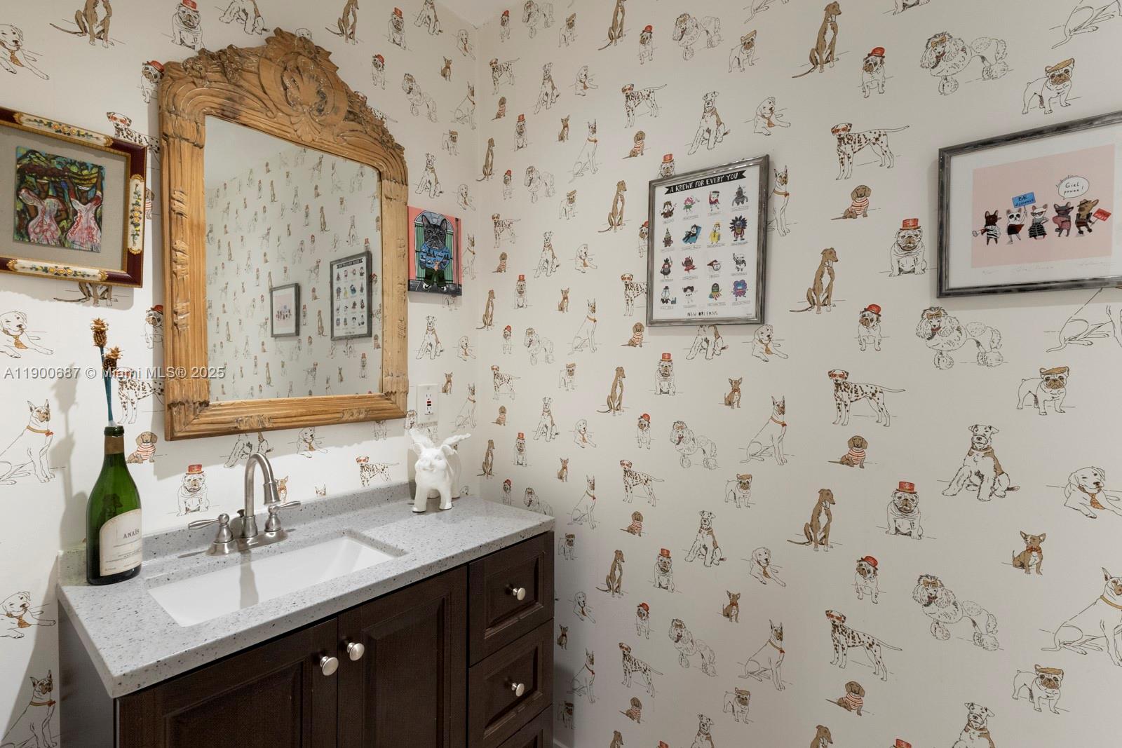 1200 Southwest 18th Street Miami, FL 33145 - Photo 16 of 36 a bathroom with a sink and a mirror