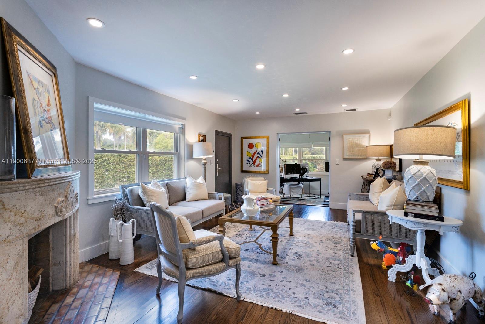 1200 Southwest 18th Street Miami, FL 33145 - Photo 2 of 36 a living room with furniture and a flat screen tv