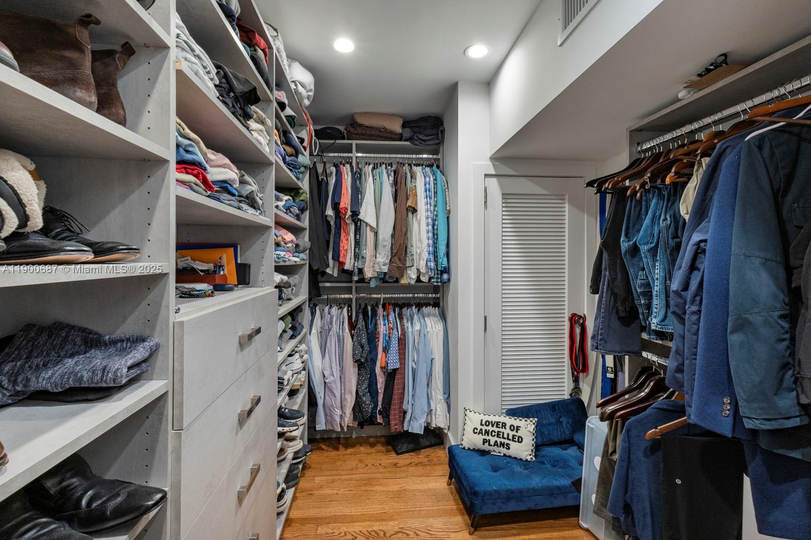 1200 Southwest 18th Street Miami, FL 33145 - Photo 21 of 36 a view of walk in closet with clothes and shoes