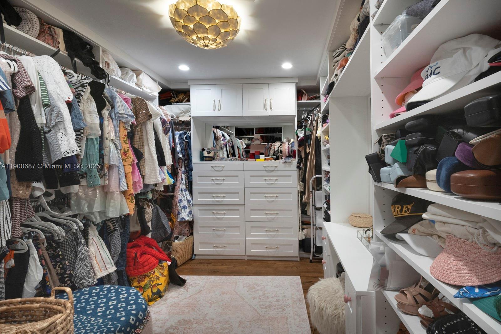 1200 Southwest 18th Street Miami, FL 33145 - Photo 22 of 36 a view of walk in closet with clothes