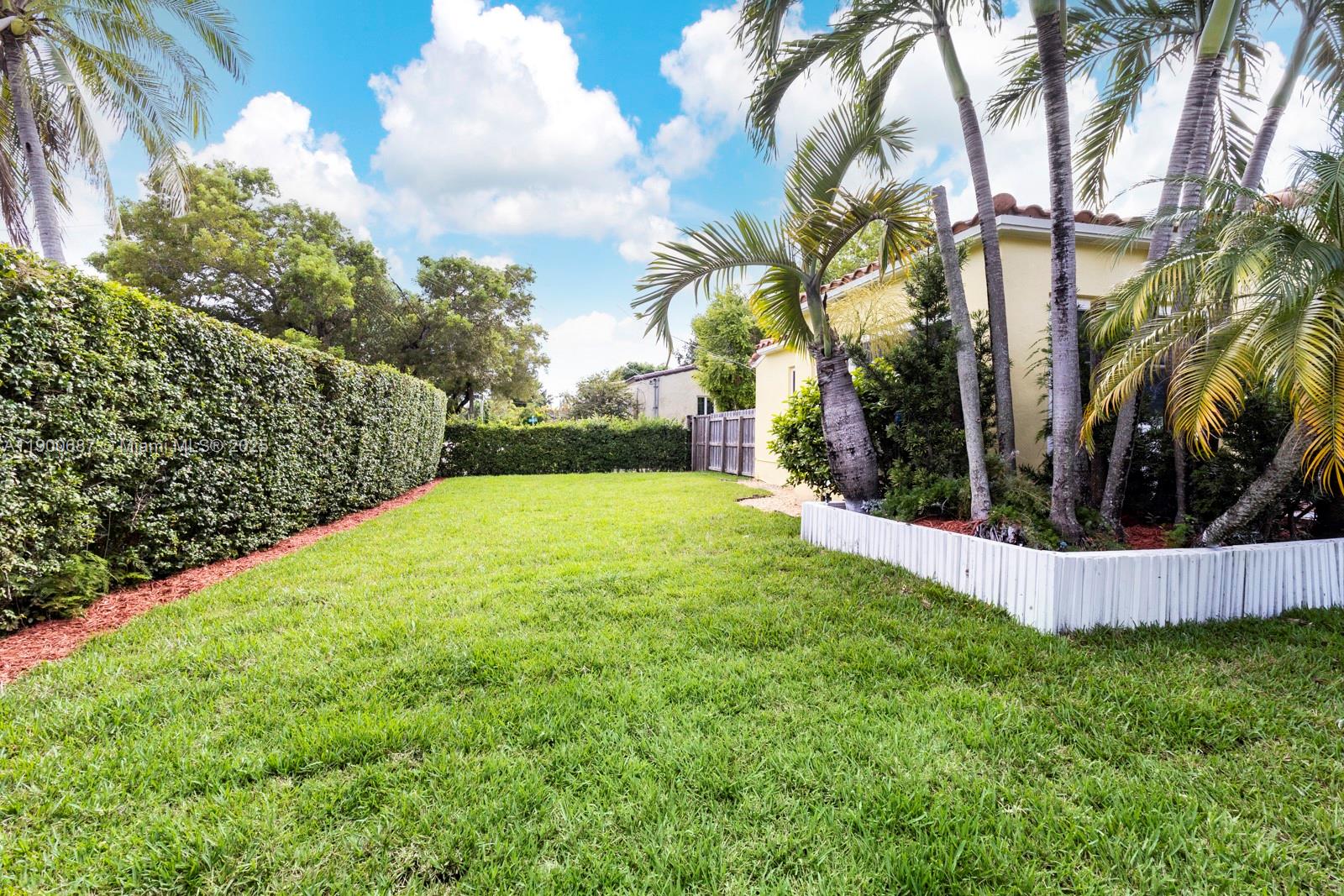1200 Southwest 18th Street Miami, FL 33145 - Photo 28 of 36 a view of a backyard with large trees