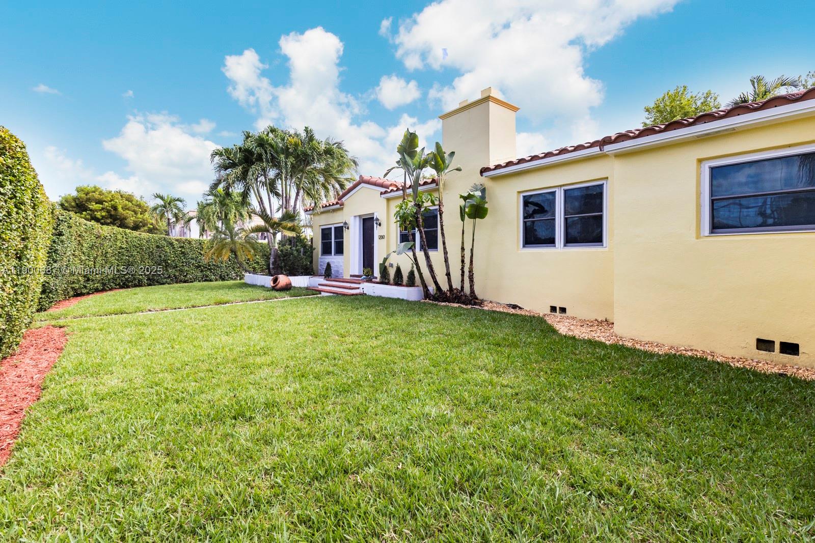 1200 Southwest 18th Street Miami, FL 33145 - Photo 35 of 36 a front view of a house with garden