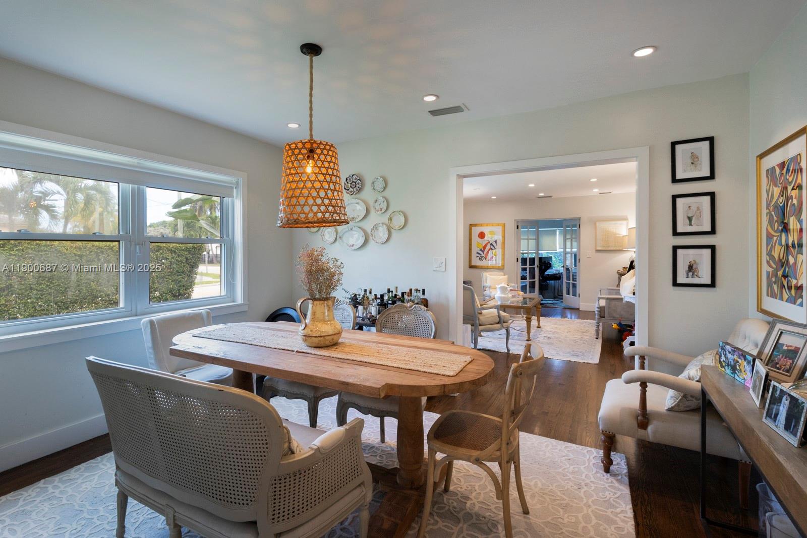 1200 Southwest 18th Street Miami, FL 33145 - Photo 10 of 36 a dining room with furniture a chandelier and window