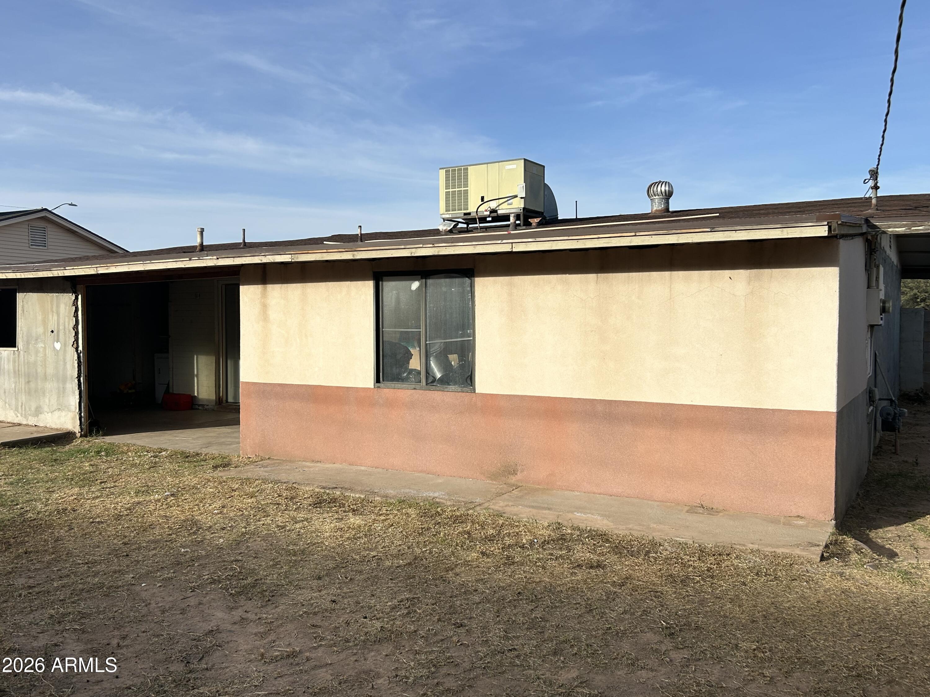 12410 North Escobar Way Phoenix, AZ 85022 - Photo 13 of 20 a view of a back yard from a big room