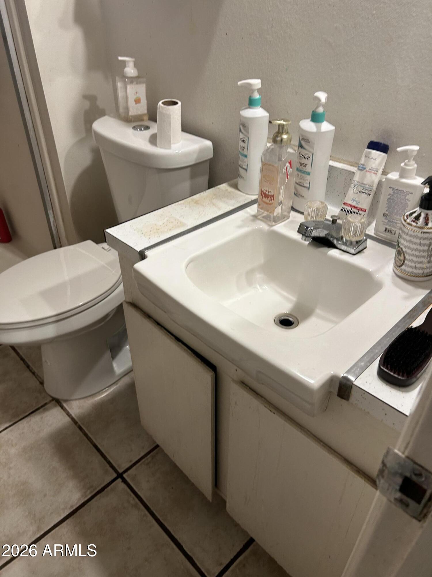 12410 North Escobar Way Phoenix, AZ 85022 - Photo 19 of 20 a bathroom with a sink and a toilet