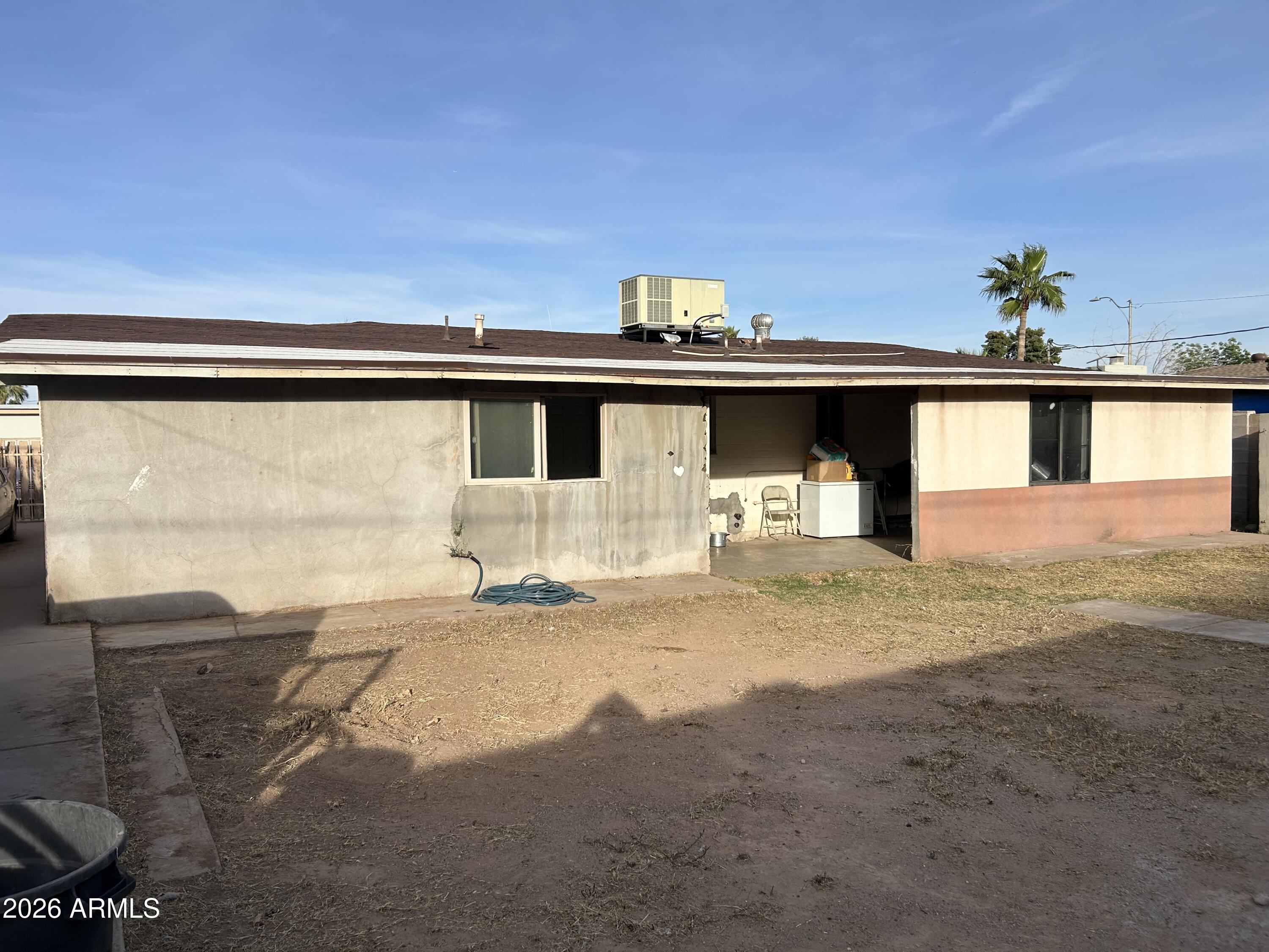 12410 North Escobar Way Phoenix, AZ 85022 - Photo 8 of 20 a front view of a house with a yard