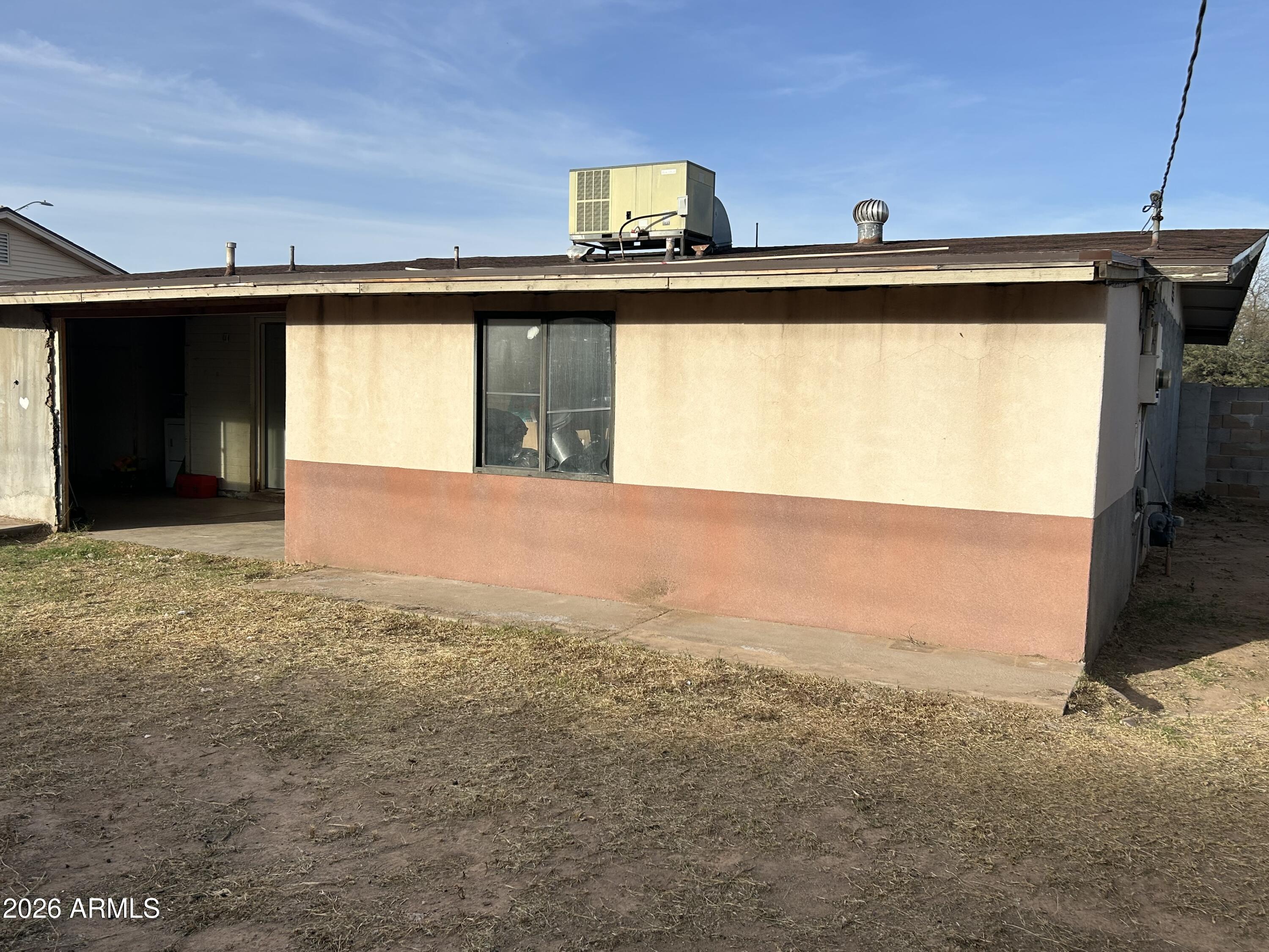 12410 North Escobar Way Phoenix, AZ 85022 - Photo 10 of 20 a view of a big room with an empty space