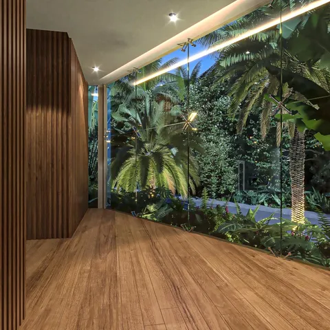 a view of a room with wooden floor