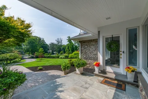 a garden view with a seating space