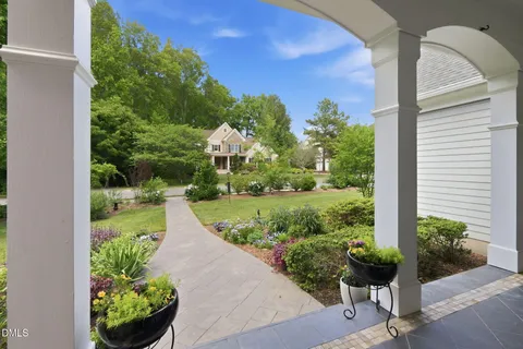 a view of a balcony with garden