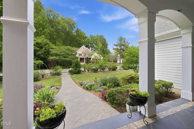 a view of a balcony with garden