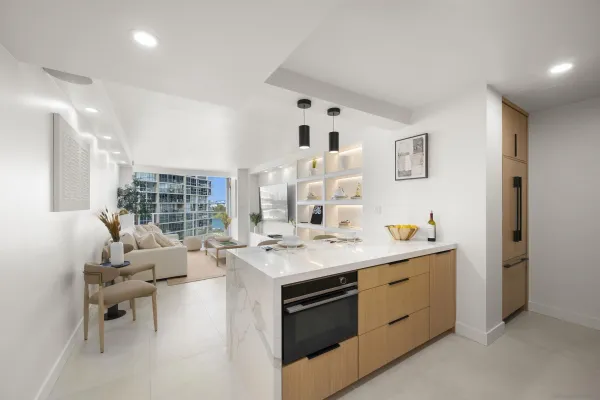 a view of living room with granite countertop furniture and a sink
