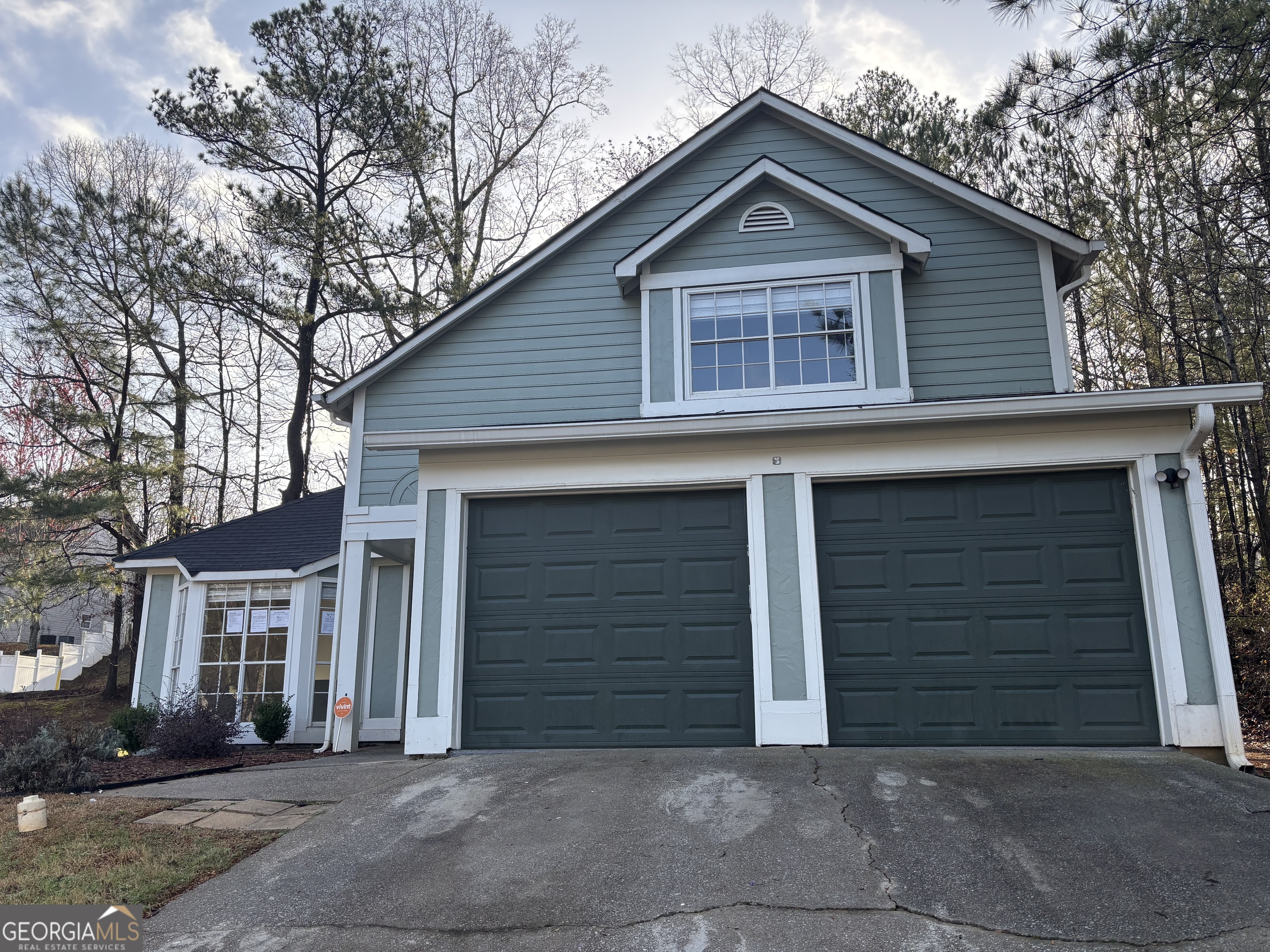 3789 Conley Downs Lane Decatur, GA 30034 - Photo 1 of 1 a front view of grey house
