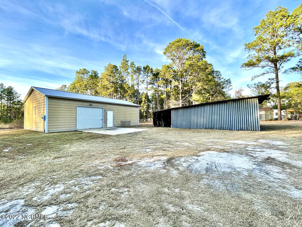 552 Sand Pit Road Aberdeen, NC 28315 - Photo 44 of 50 Storage Shed and Workshop/Garage