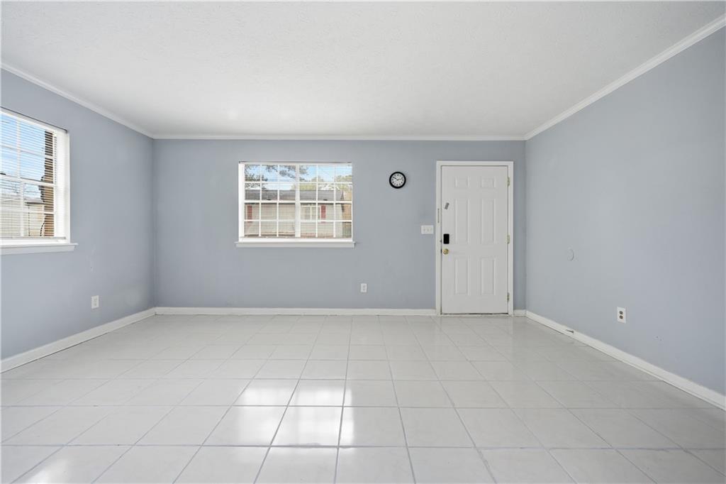 936 6 Oaks Circle, Unit B Norcross, GA 30093 - Photo 17 of 26 a view of an empty room with a window
