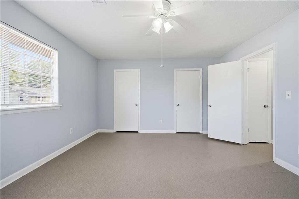 936 6 Oaks Circle, Unit B Norcross, GA 30093 - Photo 5 of 26 a view of an empty room with a window