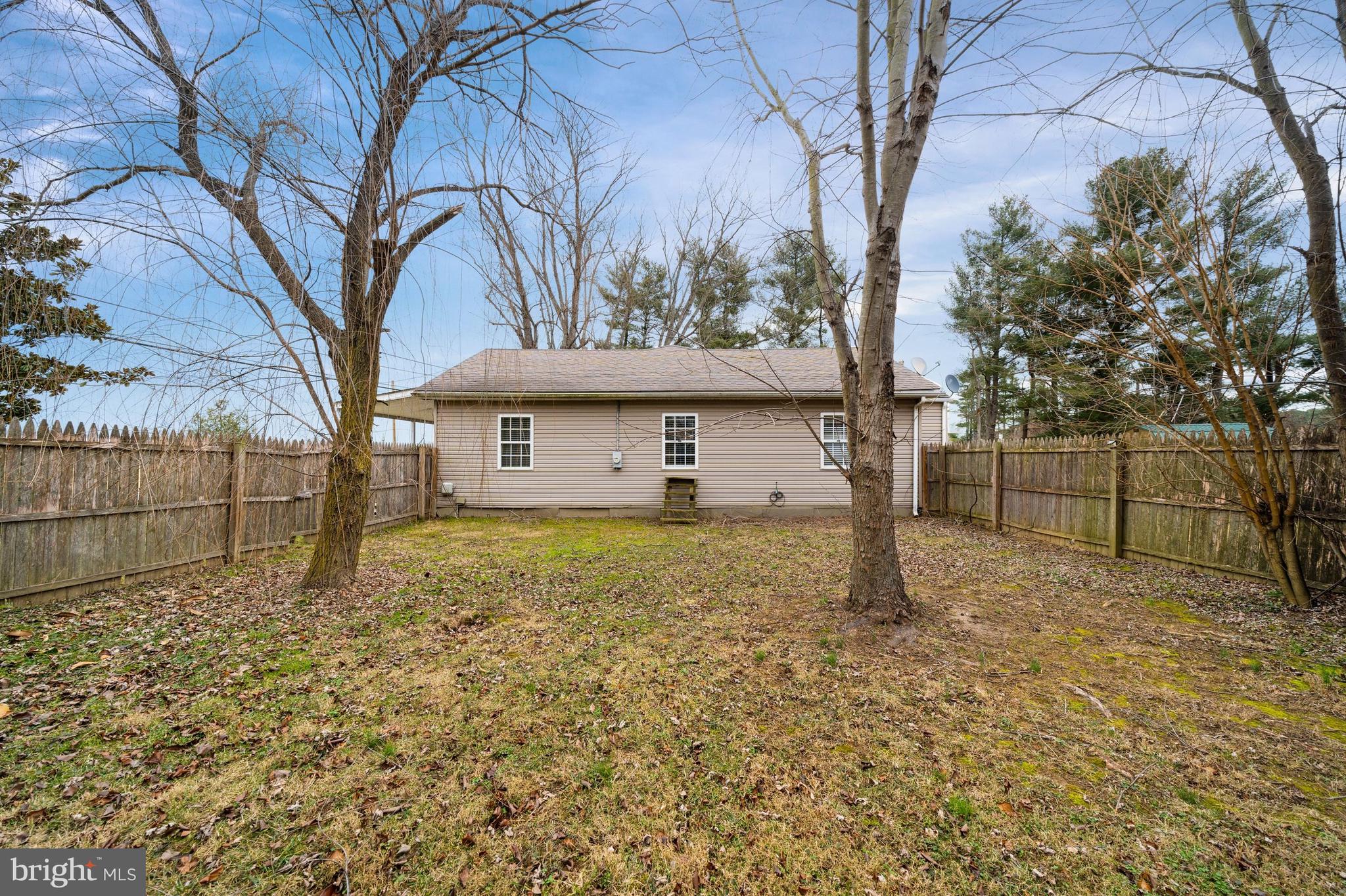 198 Cayots Corner Road Chesapeake City, MD 21915 - Photo 21 of 22 a backyard of a house with lots of green space