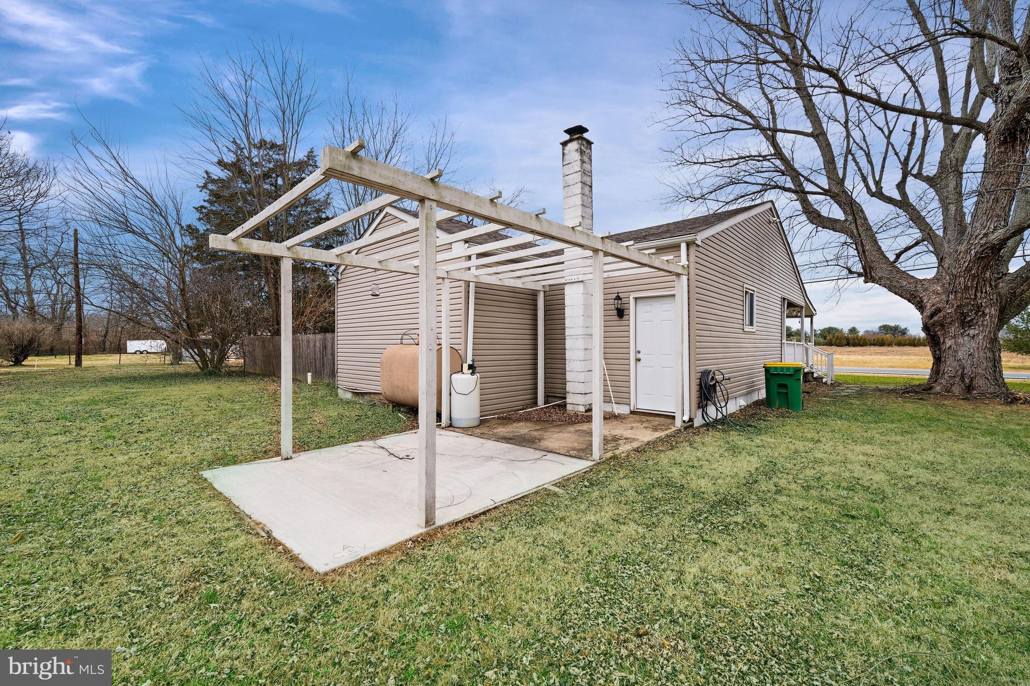 198 Cayots Corner Road Chesapeake City, MD 21915 - Photo 22 of 22 a view of a house with a yard and large tree