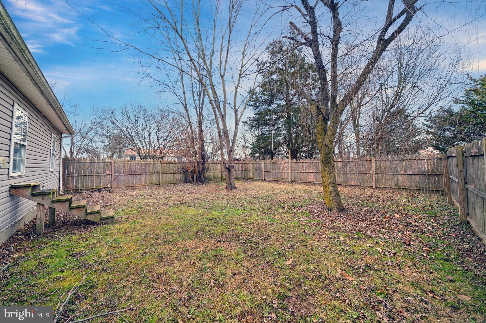 198 Cayots Corner Road Chesapeake City, MD 21915 - Photo 7 of 22 a backyard of a house with lots of green space