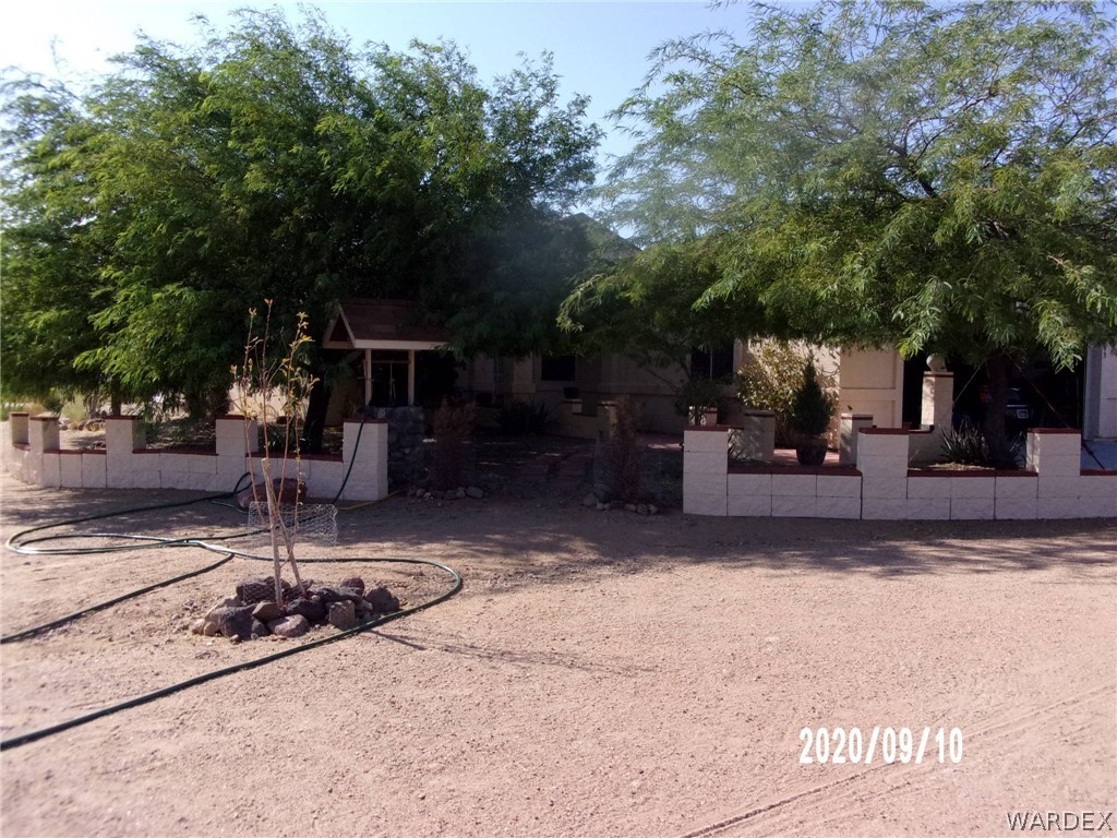 303 Bouse Road Golden Valley, AZ 86413 - Photo 1 of 42 a view of outdoor space and yard