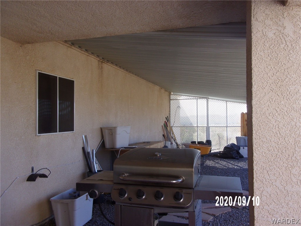 303 Bouse Road Golden Valley, AZ 86413 - Photo 14 of 42 a living room with furniture