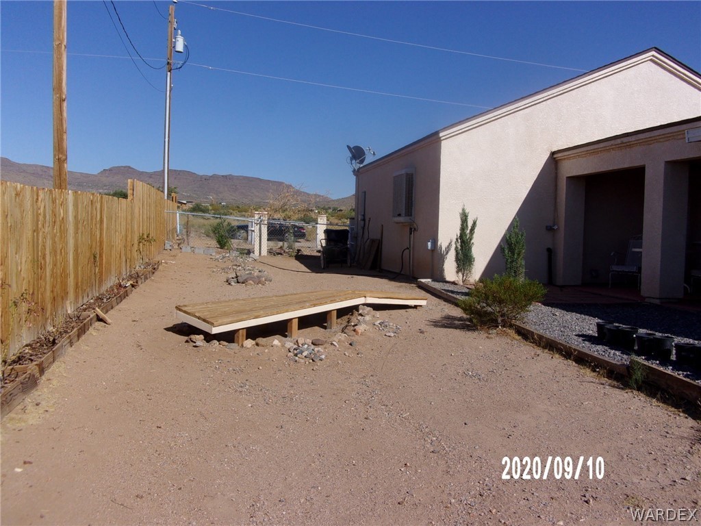 303 Bouse Road Golden Valley, AZ 86413 - Photo 16 of 42 a view of a terrace with chairs