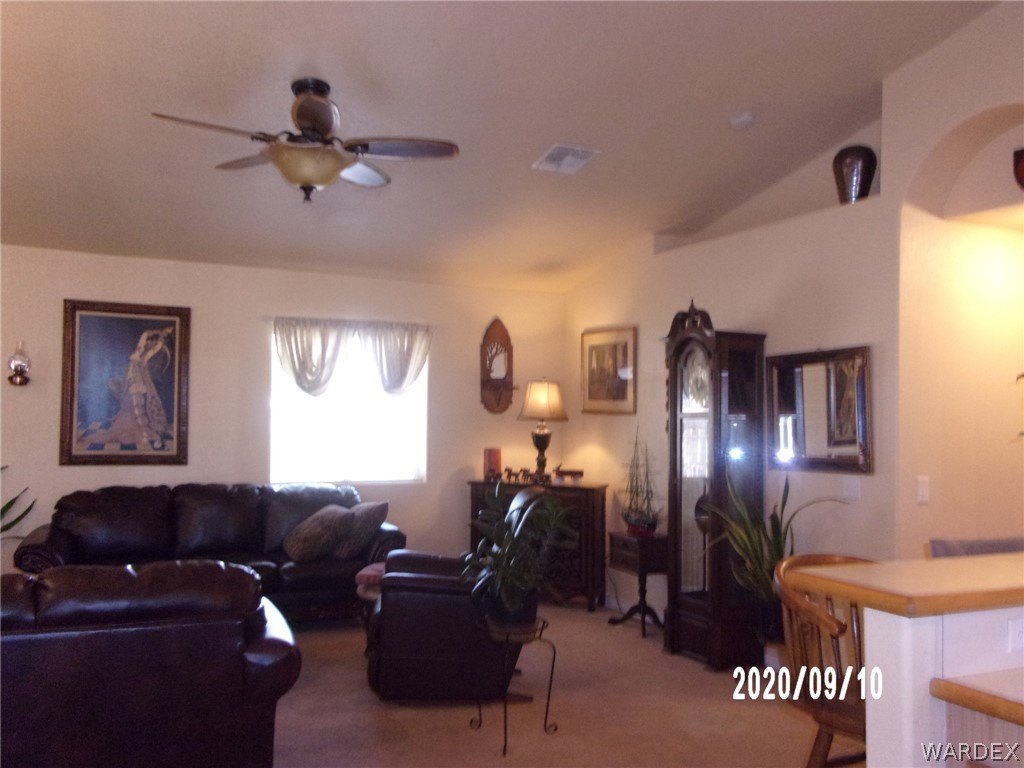 303 Bouse Road Golden Valley, AZ 86413 - Photo 26 of 42 a living room with furniture