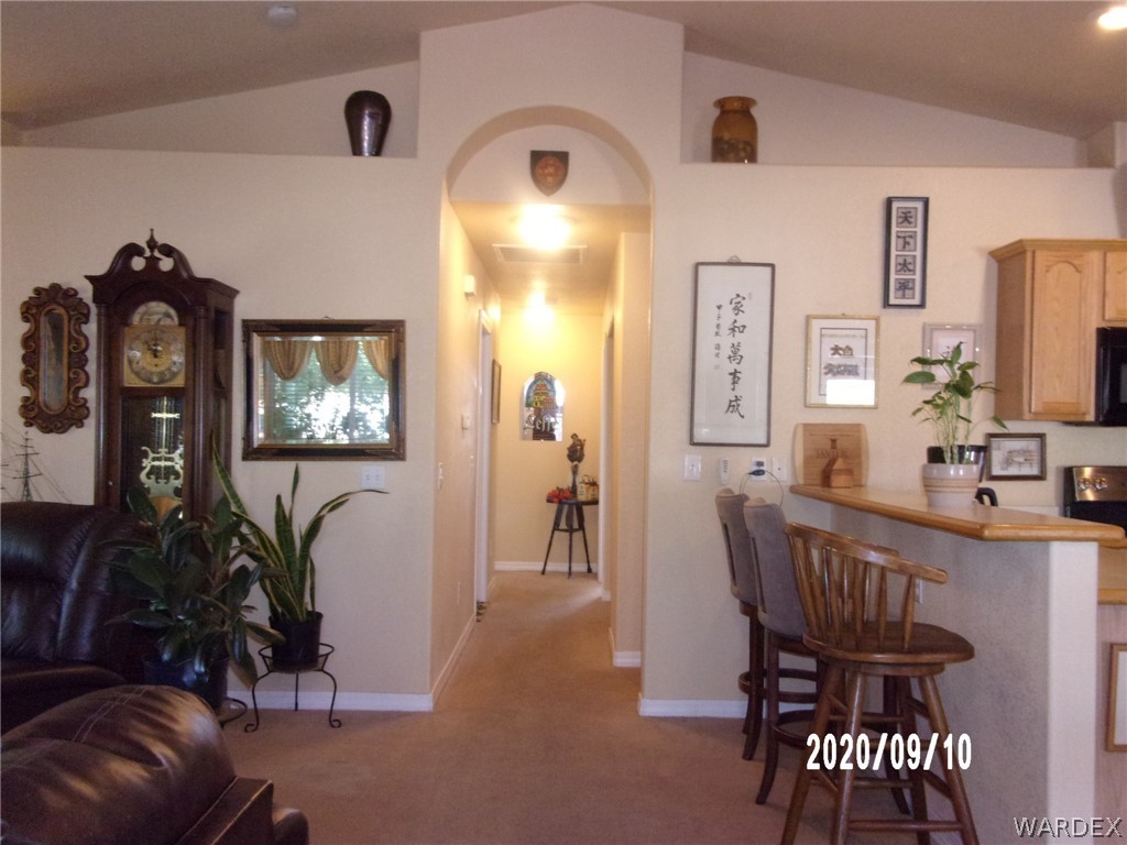 303 Bouse Road Golden Valley, AZ 86413 - Photo 28 of 42 a view of a livingroom with furniture and entryway