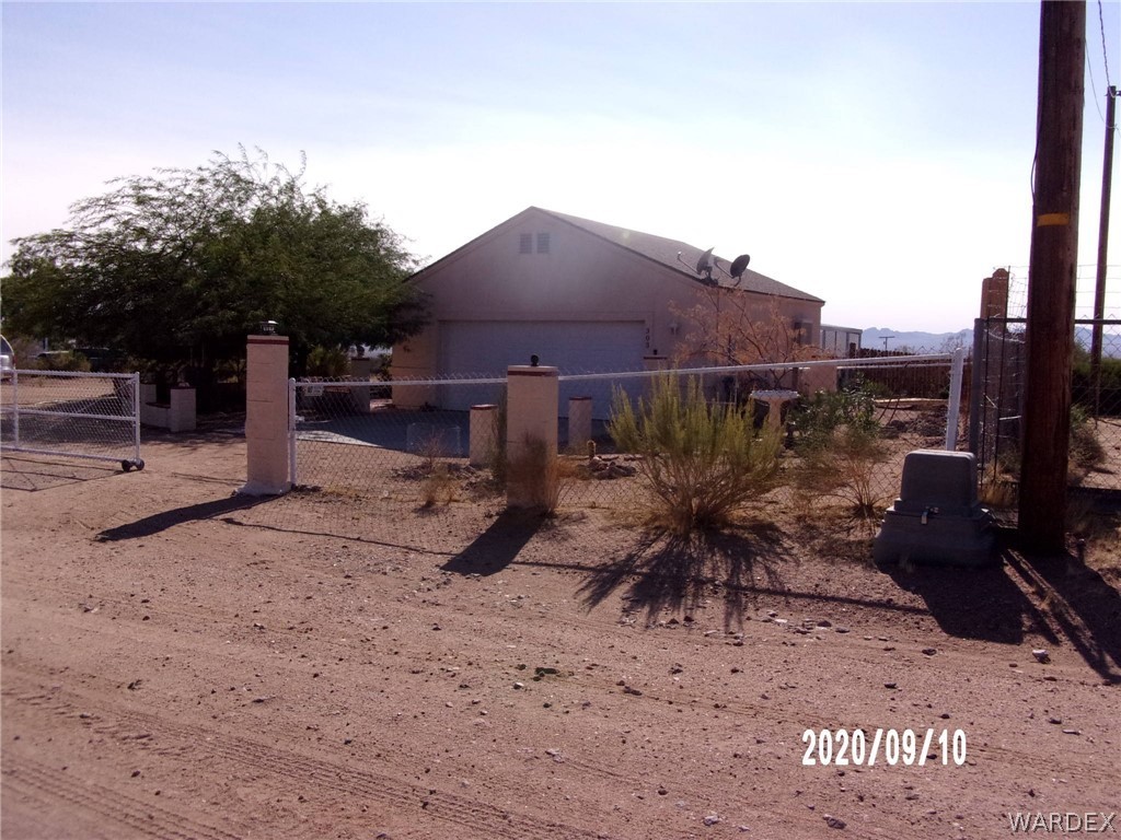 303 Bouse Road Golden Valley, AZ 86413 - Photo 3 of 42 a view of outdoor space yard and patio