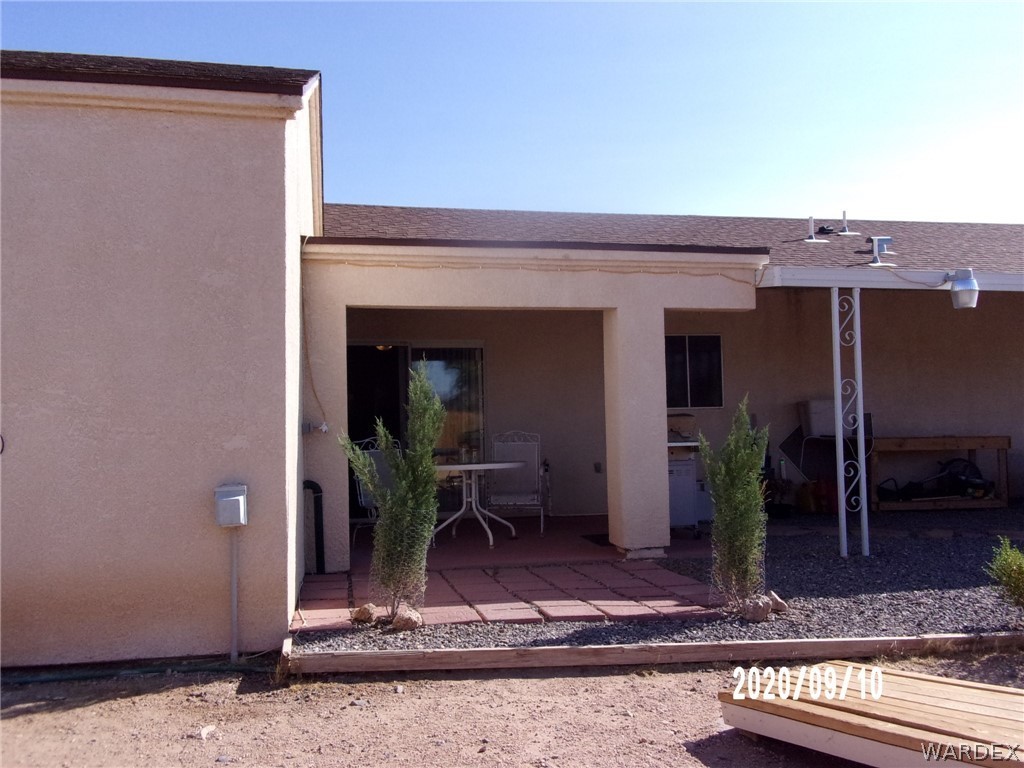 303 Bouse Road Golden Valley, AZ 86413 - Photo 10 of 42 a view of a porch with seating space