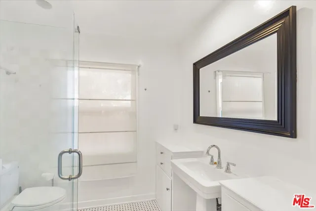 a view of a balcony with wooden floor and outdoor space