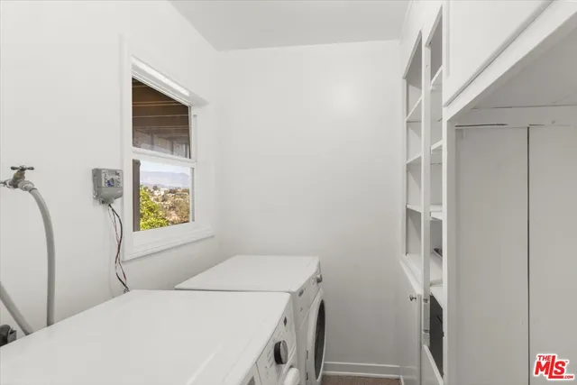 an aerial view of a city with lake view