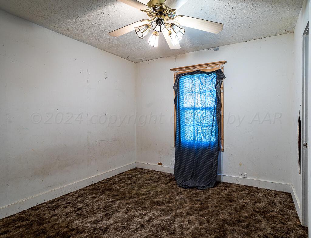 9155 County Road 13 Canadian, TX 79014 - Photo 7 of 12 Back Bedroom