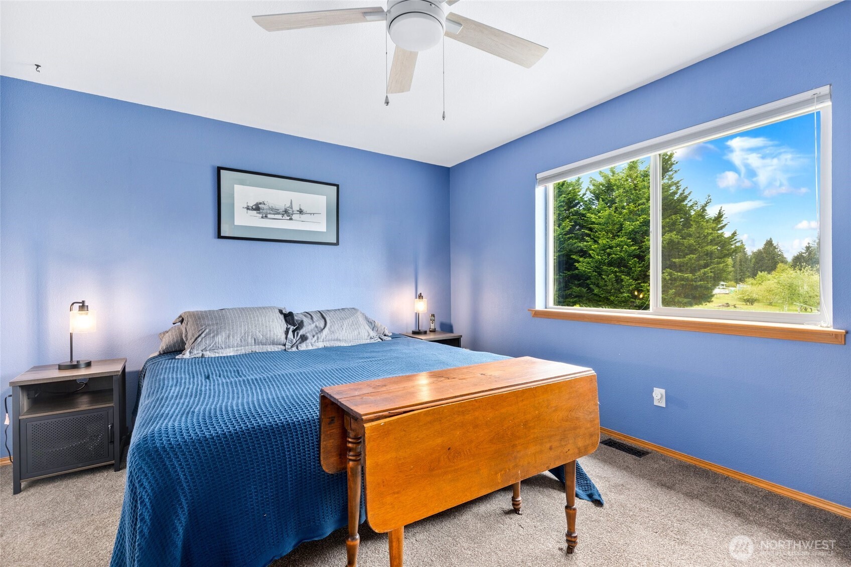 14419 Martinson Road Southeast Yelm, WA 98597 - Photo 23 of 39 a bedroom with a bed and a window