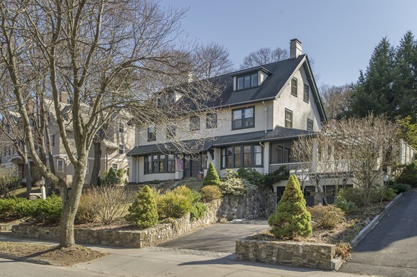 230 Buckminster Road Brookline, MA 02445 - Photo 1 of 19 a front view of a house with garden