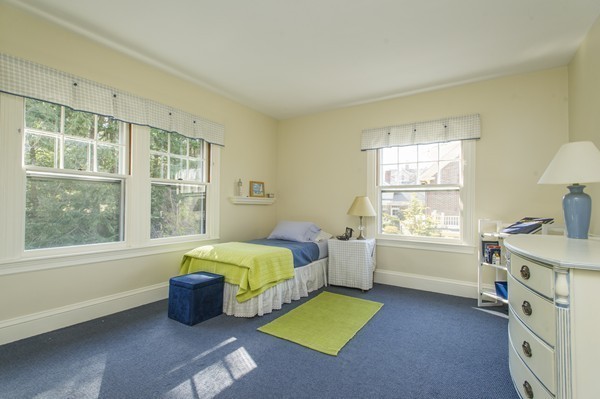 230 Buckminster Road Brookline, MA 02445 - Photo 15 of 19 a bedroom with a bed and a window