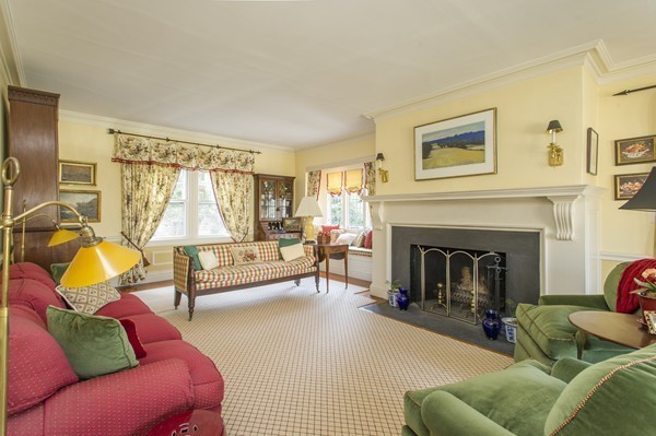 230 Buckminster Road Brookline, MA 02445 - Photo 5 of 19 a living room with furniture and a fireplace
