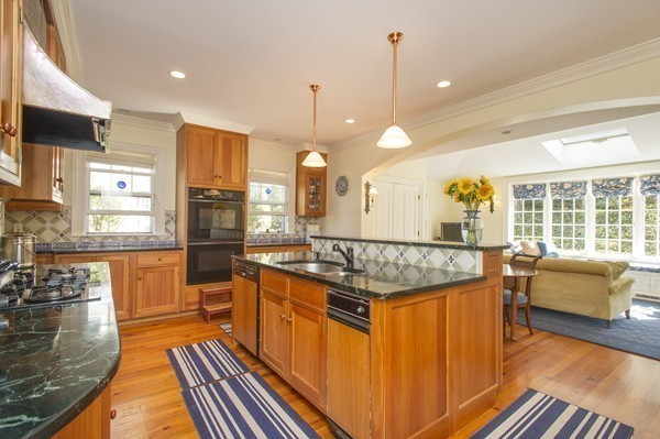 230 Buckminster Road Brookline, MA 02445 - Photo 8 of 19 a kitchen with stainless steel appliances granite countertop a stove and a sink