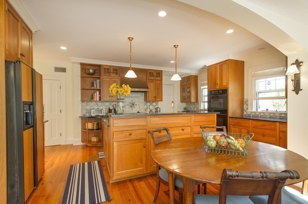 230 Buckminster Road Brookline, MA 02445 - Photo 9 of 19 a kitchen with stainless steel appliances granite countertop sink stove and refrigerator