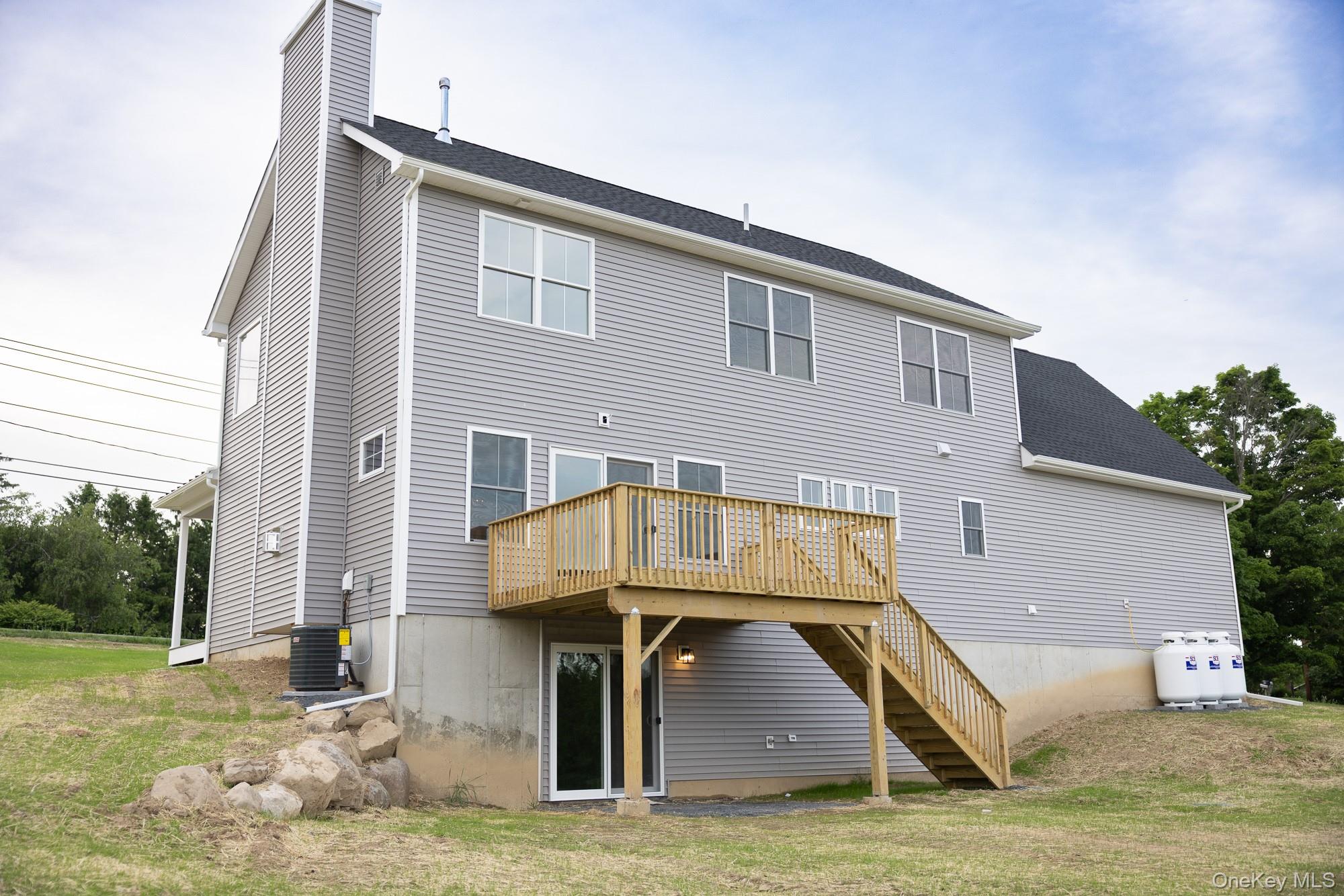 750 Ridgebury Road Slate Hill, NY 10973 - Photo 4 of 41 a view of a house with a balcony