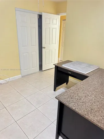 a bedroom with a bed and a cabinets