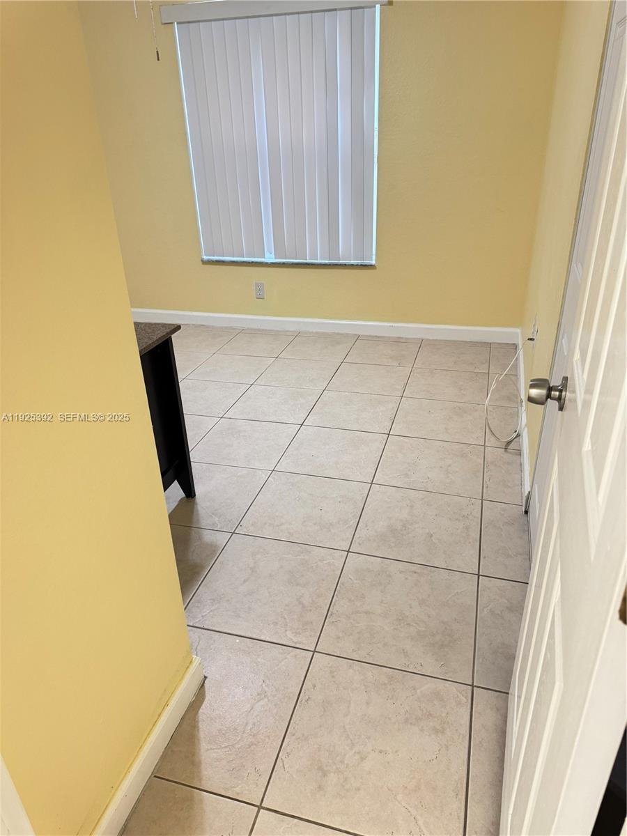 23953 Southwest 108th Court Homestead, FL 33032 - Photo 12 of 25 a view of a garage