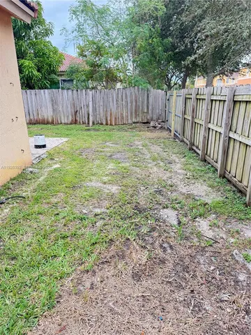 a view of backyard with green space