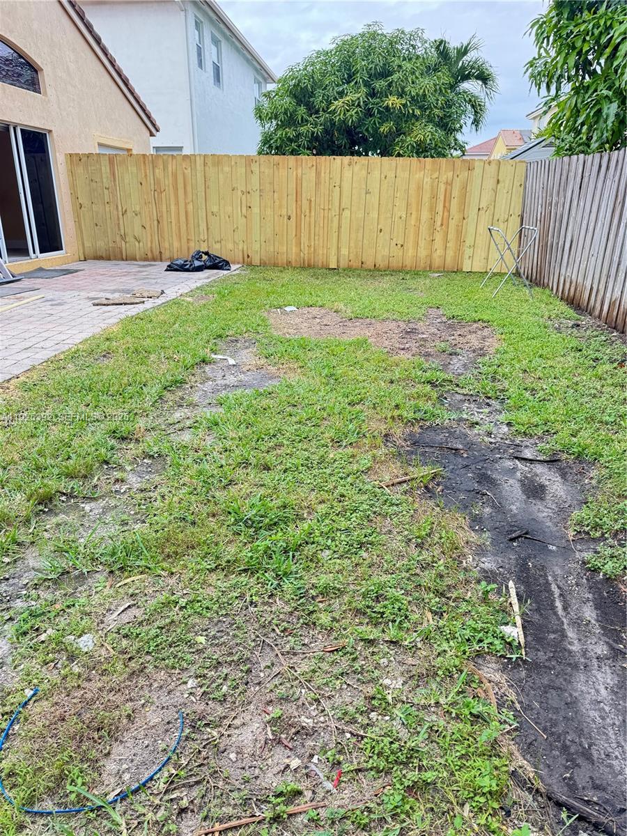 23953 Southwest 108th Court Homestead, FL 33032 - Photo 23 of 25 a view of backyard with green space