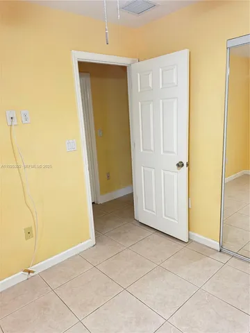 an empty room with a door